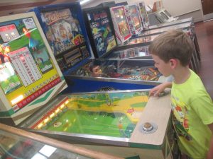 Our kids are always excited for ZapCon Eve. Milo had fun checking out some of the vintage games.